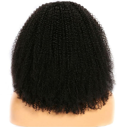 Black curly wig on a mannequin head against a white background